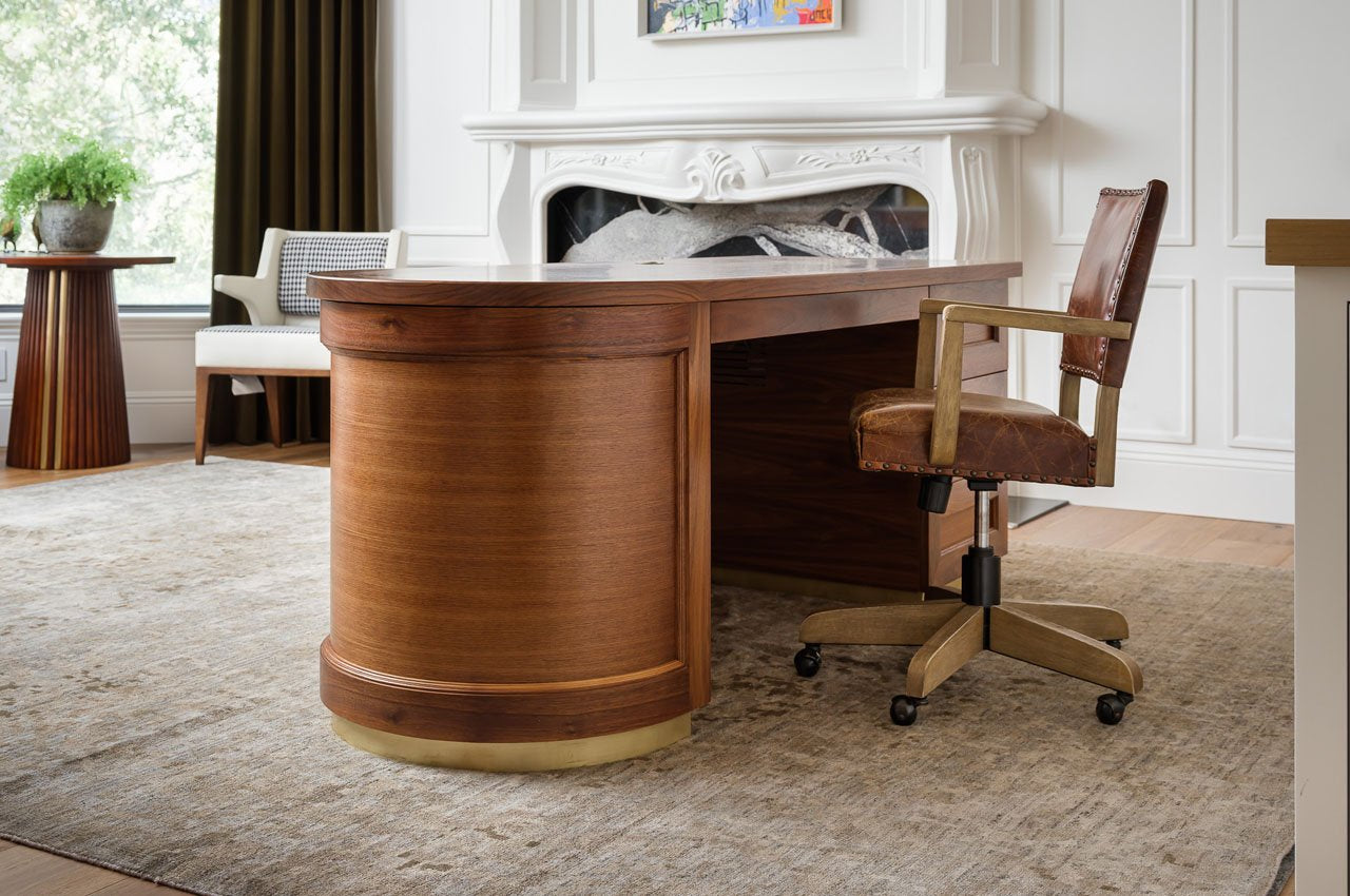 custom executive desk, walnut with brass base, mitered drawers and curved front