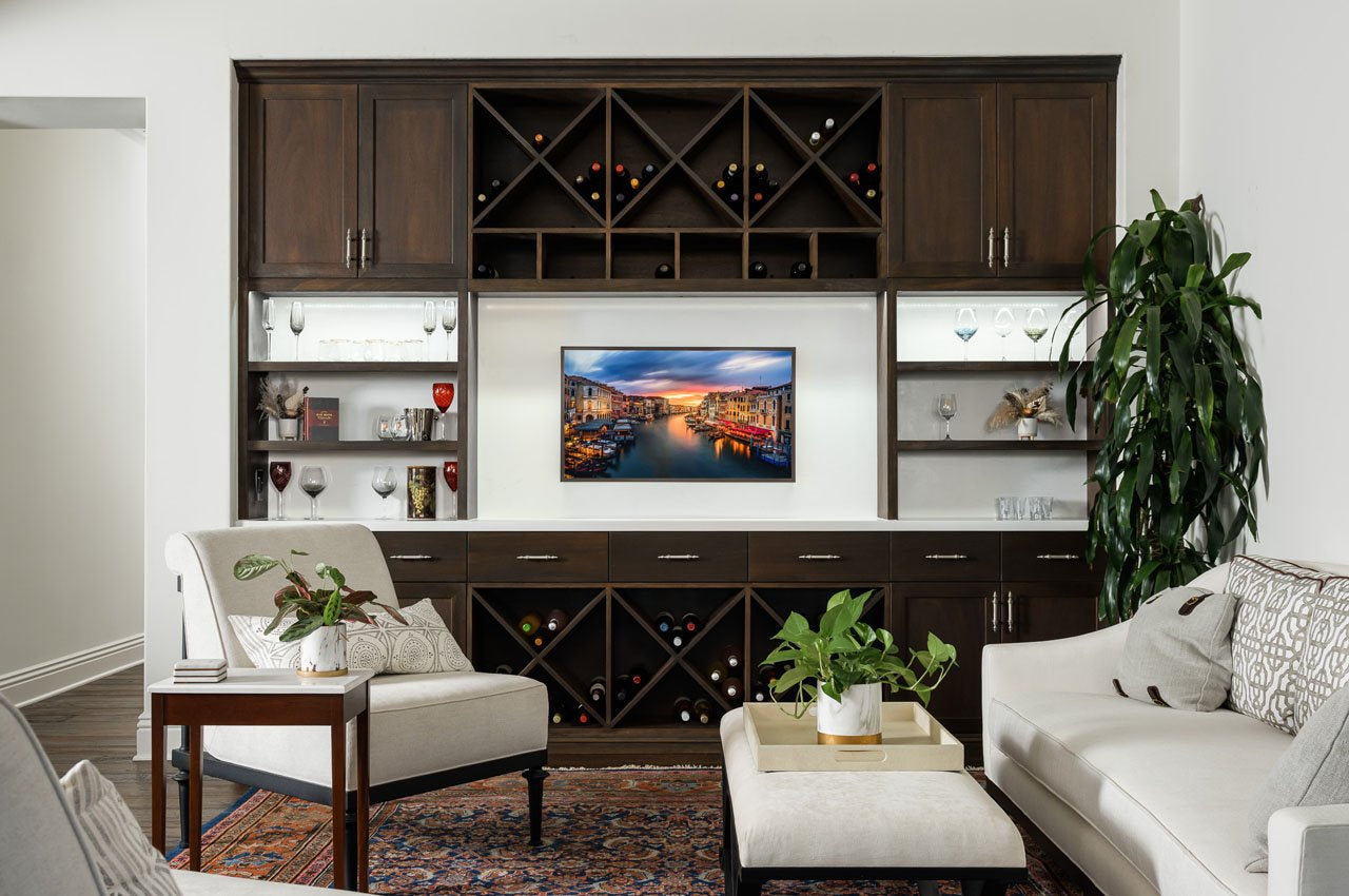 Mahogany built-in cabinets with wine storage, quartz countertop and wall backsplash